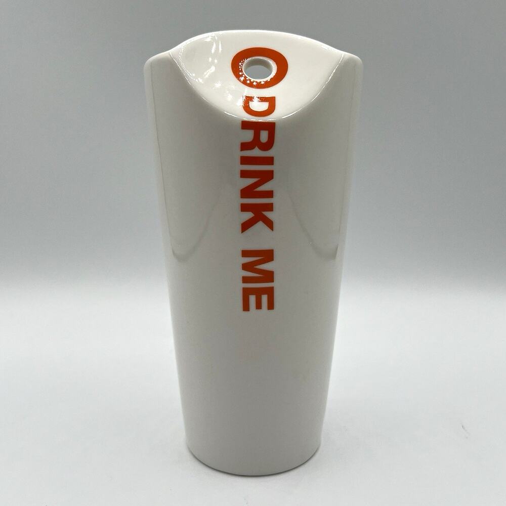 MAX BRENNER Alice “Drink Me” Coffee Mug 12 fl oz White Orange Black Ceramic